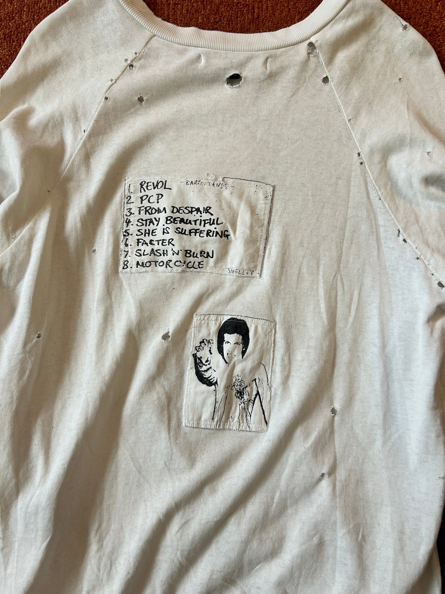 aw01 raf simons "riot riotriot" patched longsleeve